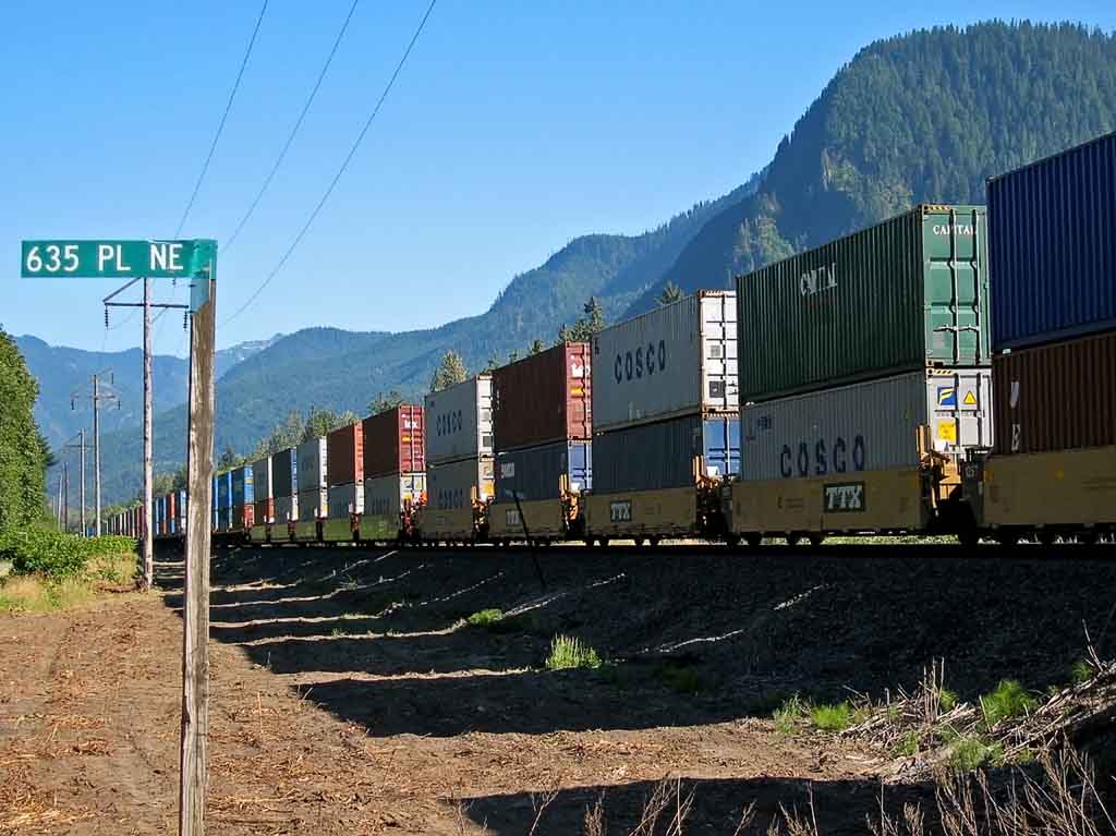 Shipping containers travel by train. (Photo: PFFY / CC, Flickr) 