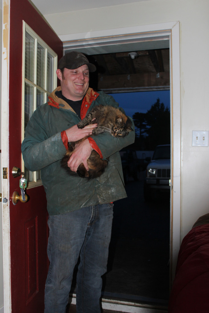 Ted Benson and his cat, Mushka Photo by Andrew Bailey/The Westerly News