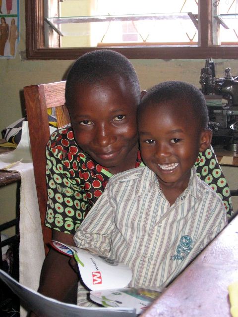 Darius is teaching his nephew Ronnie to read English. Studies show that children who are read to learn language skills quickly